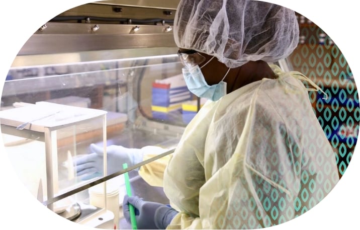 Lab worker in pharmacy lab